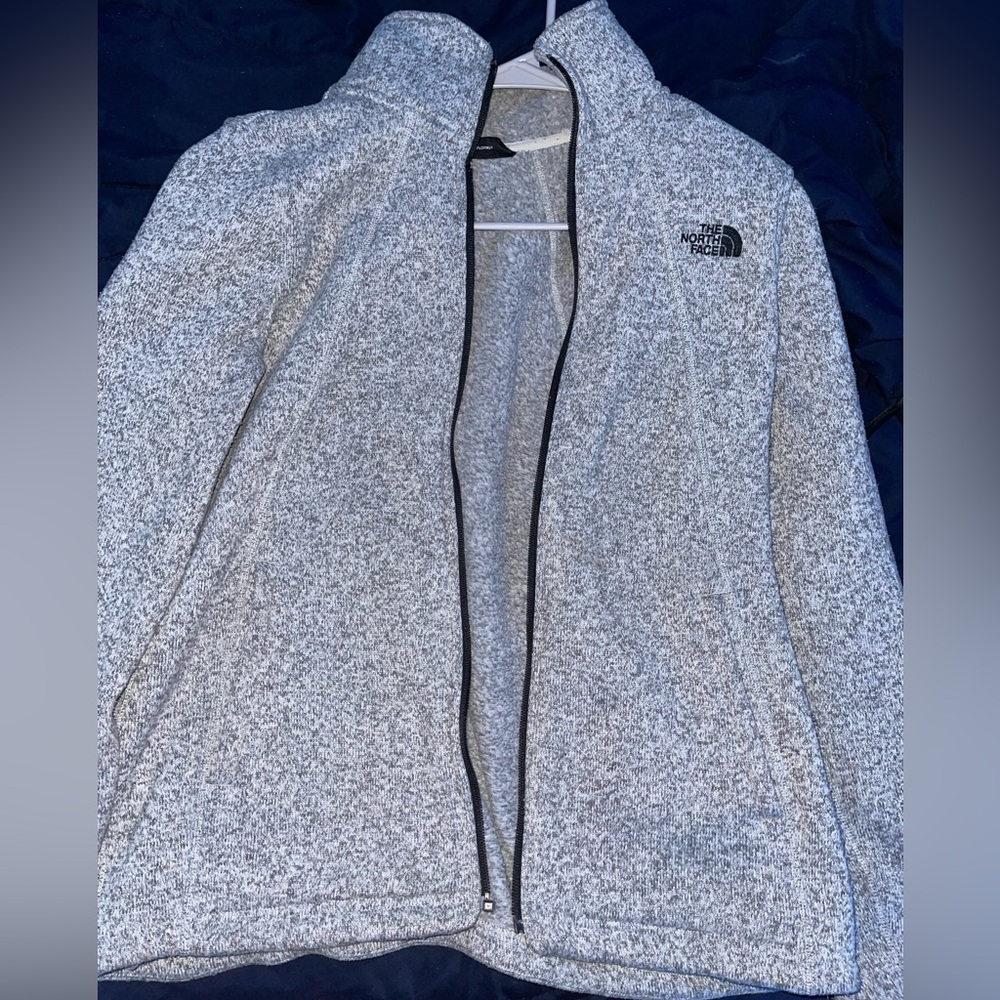 The North Face Black and Gray Ski Jacket with Fleece Texture and Stand-Up Collar
